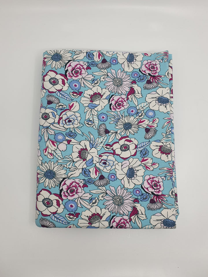 Hellblauer Single-Jersey mit Blumen Muster