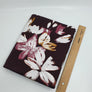 Bordeauxroter Interlock mit Blumen