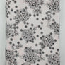 Rosamelierter Interlock mit schwarzen Blumen
