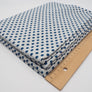 Graumelierter Single-Jersey - mit blauen Punkten