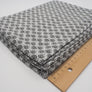 Graumelierter Single-Jersey mit schwarzem Muster