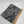 Grauermelierter Interlock mit schwarzem Muster