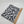 Hellgraumelierter Single-Jersey mit schwarzem Muster